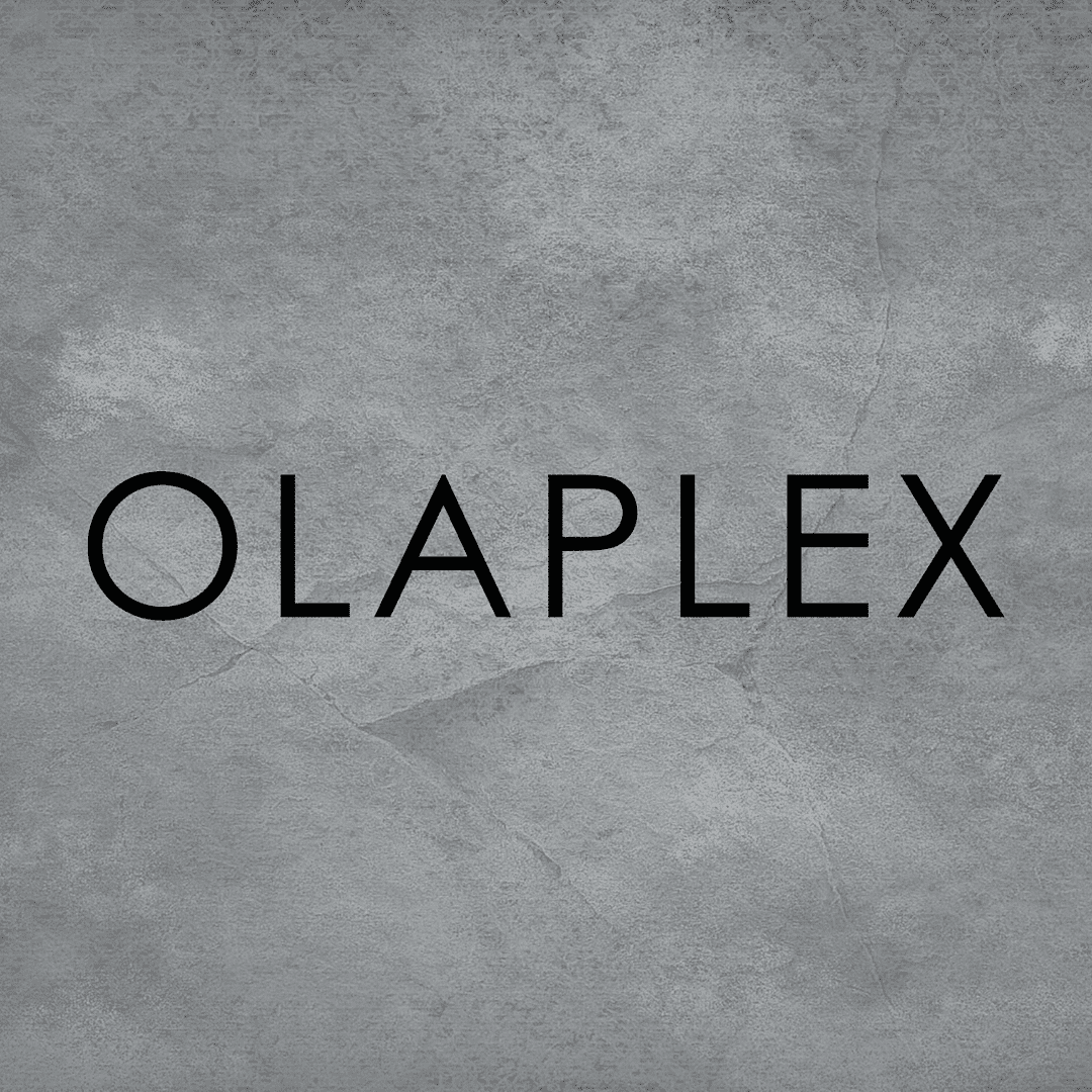 Logo of Olaplex on a textured grey background.